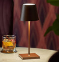 Zafferano Poldina Mini rechargeable rust table lamp with IP65 waterproof rating and over 9 hours battery life