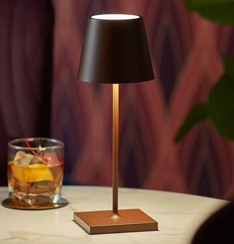 Zafferano Poldina Mini rechargeable rust table lamp with IP65 waterproof rating and over 9 hours battery life