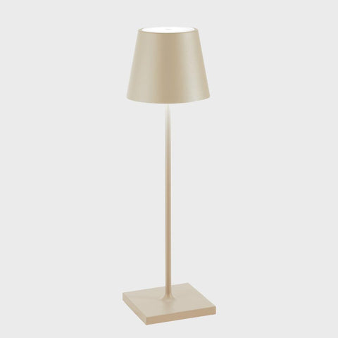 Zafferano Poldina Pro rechargeable sand-colored LED table lamp with sleek modern design and waterproof rating for indoor and outdoor use