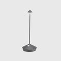 Zafferano Pina Pro rechargeable dark grey table lamp with touch controls and sleek design for indoor and outdoor use
