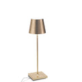 Zafferano Poldina Pro rechargeable gold table lamp with sleek, portable design and up to 9 hours of battery life for indoor and outdoor use