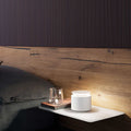 Zafferano Push-up rechargeable table lamp with warm adjustable lighting on bedside table