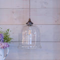 Hythe Medium Clear Glass Pendant Light with handcrafted clear glass shade and adjustable flex, ideal for modern home decor