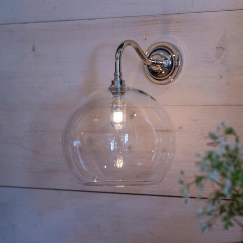 Soho large clear glass shade bathroom wall light with chrome finish mounted on wooden wall
