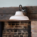 Hartington Ceramic Shade Wall Light with ribbed ceramic shade and swan neck arm providing warm ambient glow