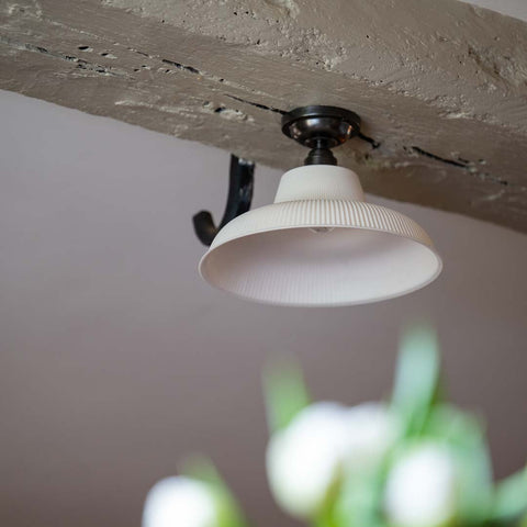 Hartington Ribbed Ceramic Shade Flush Ceiling Light with flared ribbed ceramic design providing warm, diffused light for low ceilings