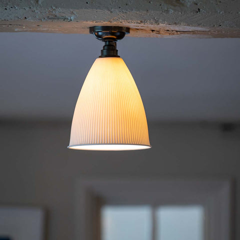 Grosvenor Ribbed Ceramic Shade Flush Ceiling Light with flared ribbed ceramic shade providing warm diffused lighting