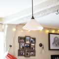 Coolie Ceramic Shade Pendant Light with smooth flared ceramic shade and warm glow