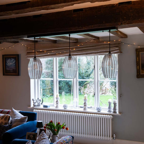 Bespoke bar pendant light with three medium ribbed Camber shades, customizable flex and bar length, ideal for kitchen island or dining room lighting.