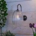 Camber Large Ribbed Glass Shade Wall Light with ribbed glass and swan neck arm in antique brass finish