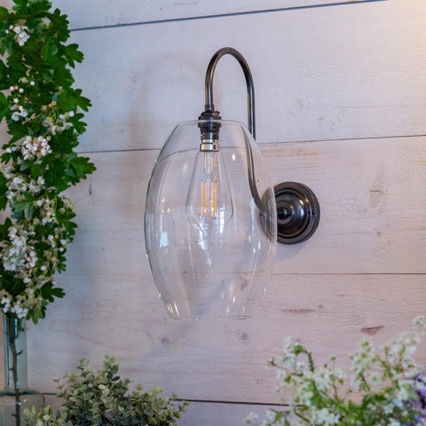 Camber Large Clear Glass Shade Wall Light with ribbed glass and swan neck arm in antique brass finish