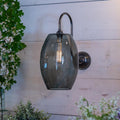 Camber Large Smoked Glass Wall Light with long swan neck arm in antique brass finish