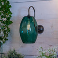 Camber Large teal Glass Wall Light with amber glass shade and swan neck arm in antique brass finish