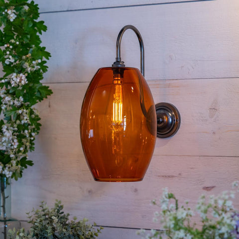 Camber Large Amber Glass Wall Light with amber glass shade and swan neck arm in antique brass finish