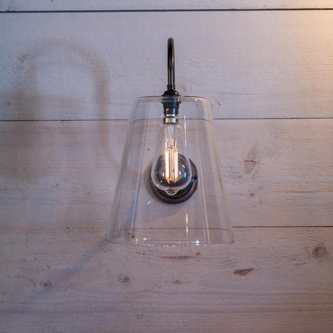 Newbury Large Clear Shade wall light with clear glass and swan neck arm in antique brass finish