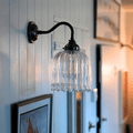 Hythe Small Ribbed Glass Shade Wall Light with clear ribbed glass and compact design for warm, elegant wall lighting