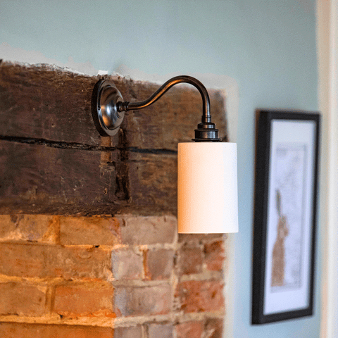 Stockwell Small Ceramic Shade Wall Light with smooth cylindrical ceramic shade and downward soft illumination