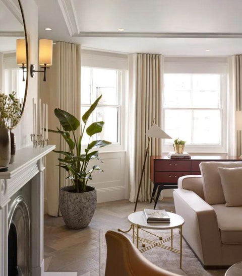 Drunmore Single Sconce Wall Light by Aerin Lauder in Antique Brass