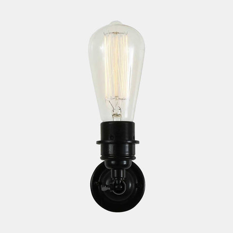 Kennet Adjustable Wall Light with industrial-style black fixture and exposed vintage bulb