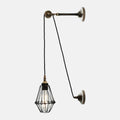 Kairi Pulley Wall Light vintage industrial design with adjustable pulley and brass cage shade