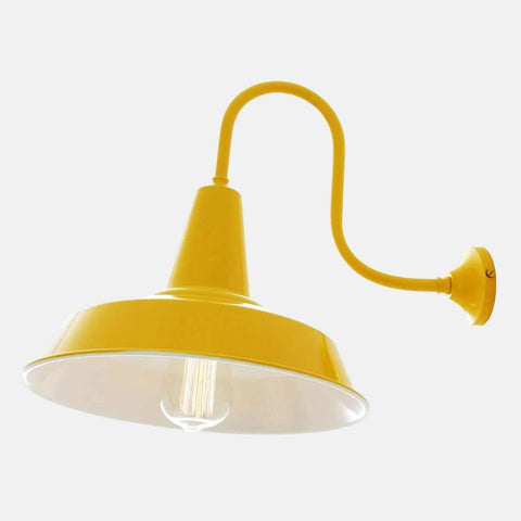 Yellow industrial-style Salton Wall Light with brass and aluminium construction and white interior finish.
