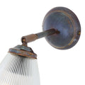 Gadar Adjustable Wall Light with rusted metal finish and prismatic glass shade for modern industrial interiors