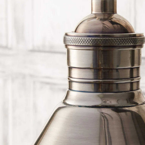 Close-up of antique silver Pooky Stork Wall Light made of high-quality brass with adjustable arm and detailed craftsmanship