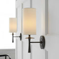 Drunmore Single Sconce wall light by Aerin Lauder with hand-bronzed brass and white linen shade