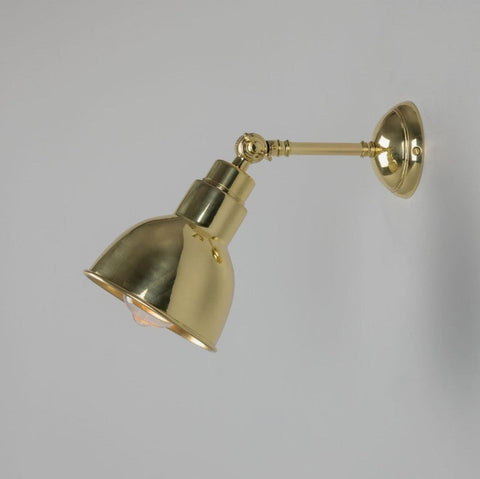 Moorlea brass adjustable wall light with vintage industrial design and flexible arm for focused indoor lighting