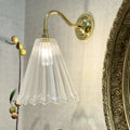 Rye Medium Ribbed Glass Shade cone-shaped bathroom wall light with IP44 rating