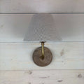 textured waffle empire shade, handmade in the uk 20cm. On a mango wood wall light ficxture with a brass arm