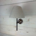 textured waffle empire shade, handmade in the uk 20cm. On an antique brass straight arm lupin fitting handcrafted in the UK.