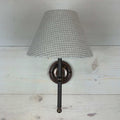 textured waffle empire shade, handmade in the uk 20cm. On an antique brass straight arm lupin fitting handcrafted in the UK.