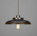 Telal Pendant Light with vintage brass finish and braided cord creating warm ambient lighting